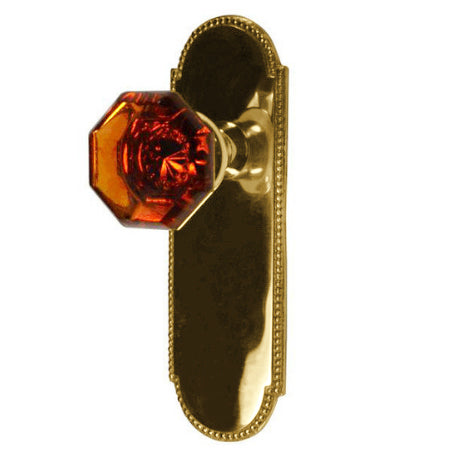 Arched Beaded Backplate Door Set with Octagon Amber Glass Door Knobs (Several Finishes Available)
