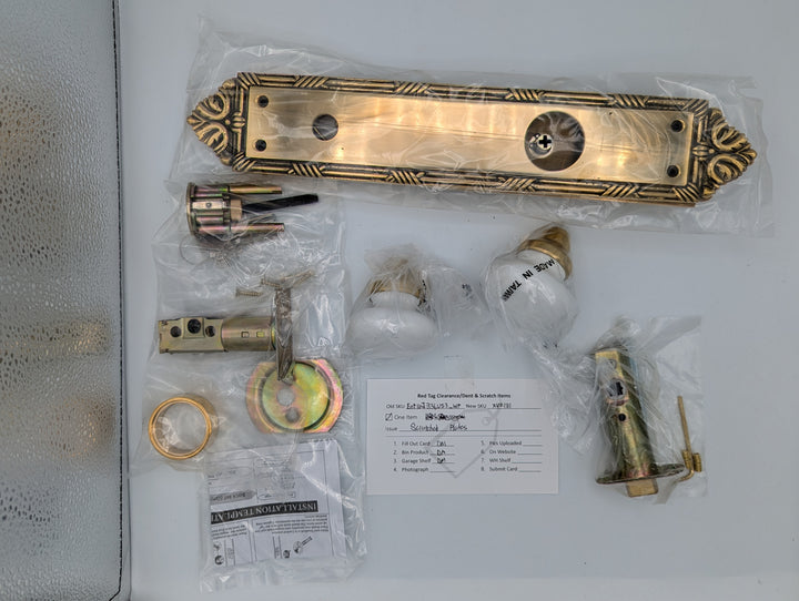 Open Box Sale Item Ribbon & Reed Oval Deadbolt Entryway Set (Polished Brass with White Porcelain Knob)