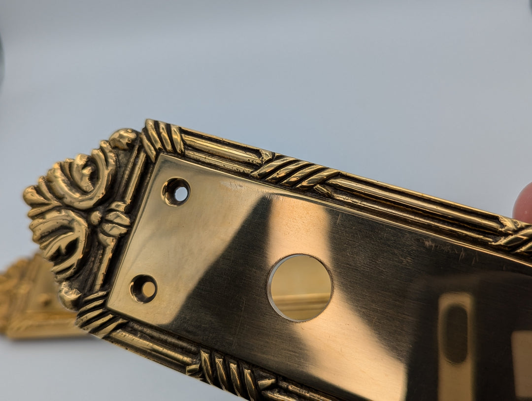 Open Box Sale Item Ribbon & Reed Oval Deadbolt Entryway Set (Polished Brass with White Porcelain Knob)